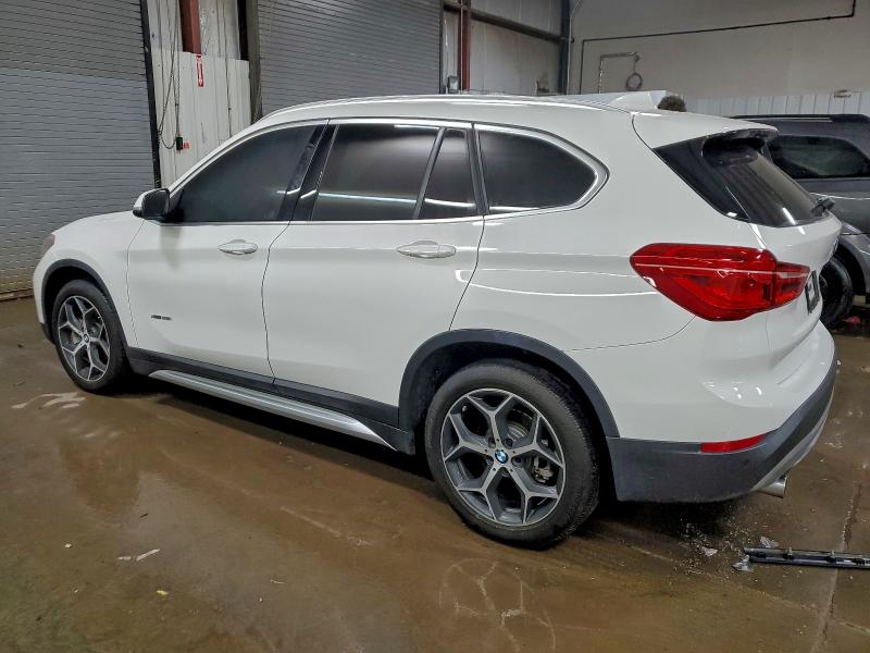 Photo 2 from auction – 2017 BMW X1 XDRIVE2 with VIN WBXHT3C37H5F69191