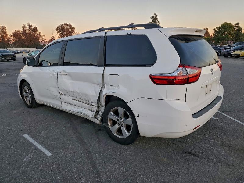 Photo 2 from auction – 2015 TOYOTA SIENNA LE with VIN 5TDKK3DC8FS649480