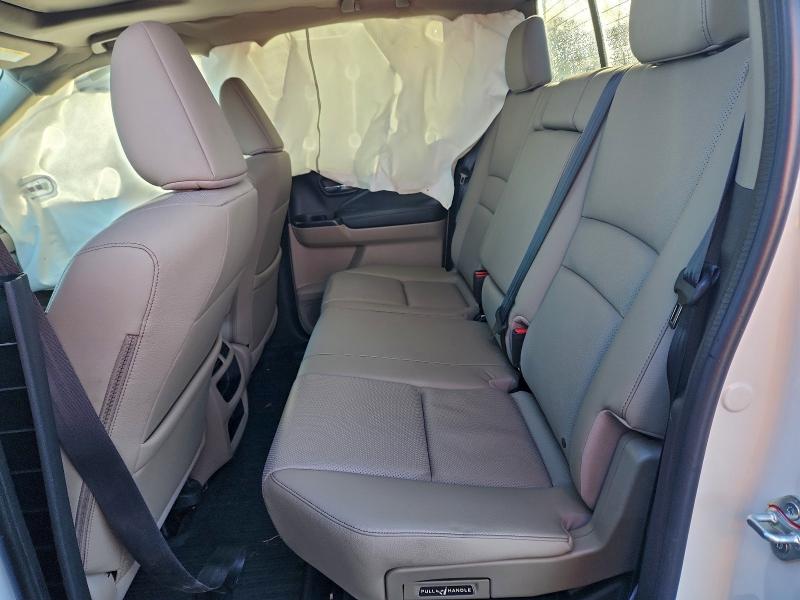 Photo 10 from auction – 2022 HONDA RIDGELINE with VIN 5FPYK3F59NB037341