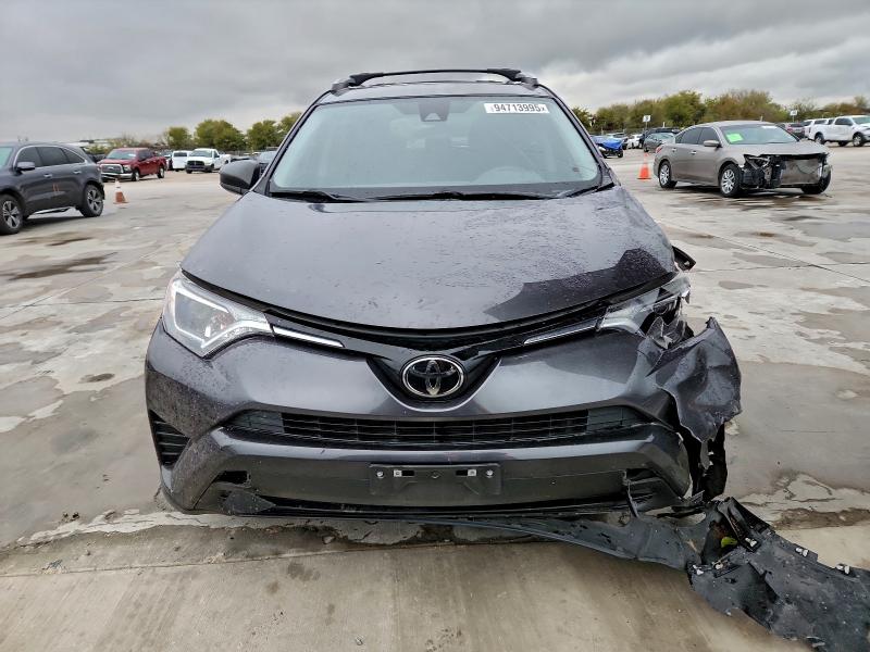 Photo 5 from auction – 2017 TOYOTA RAV4 LE with VIN JTMZFREV3HJ137311