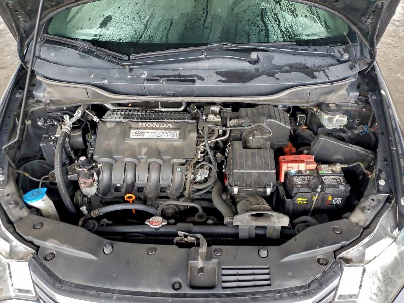 Photo 11 from auction – 2011 HONDA INSIGHT EX with VIN JHMZE2H78BS009900