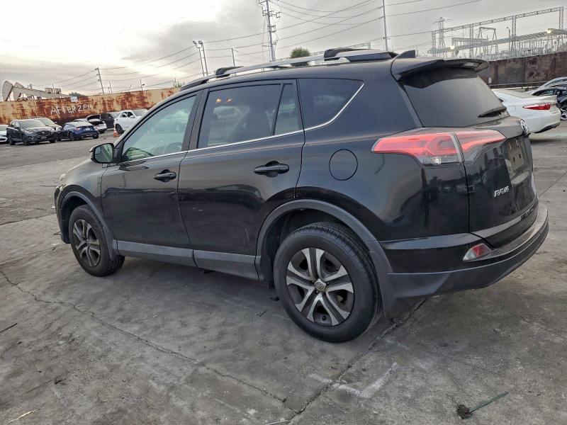 Photo 2 from auction – 2018 TOYOTA RAV4 LE with VIN 2T3ZFREV2JW473765