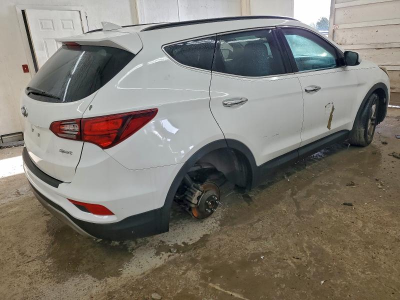 Photo 3 from auction – 2017 HYUNDAI SANTA FE S with VIN 5NMZU3LB1HH036317