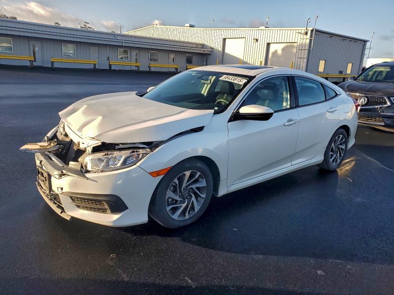 Photo 1 from auction – 2018 HONDA CIVIC EX with VIN 19XFC2F7XJE209045