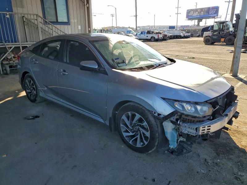 Photo 4 from auction – 2018 HONDA CIVIC EX with VIN 19XFC2F88JE034805