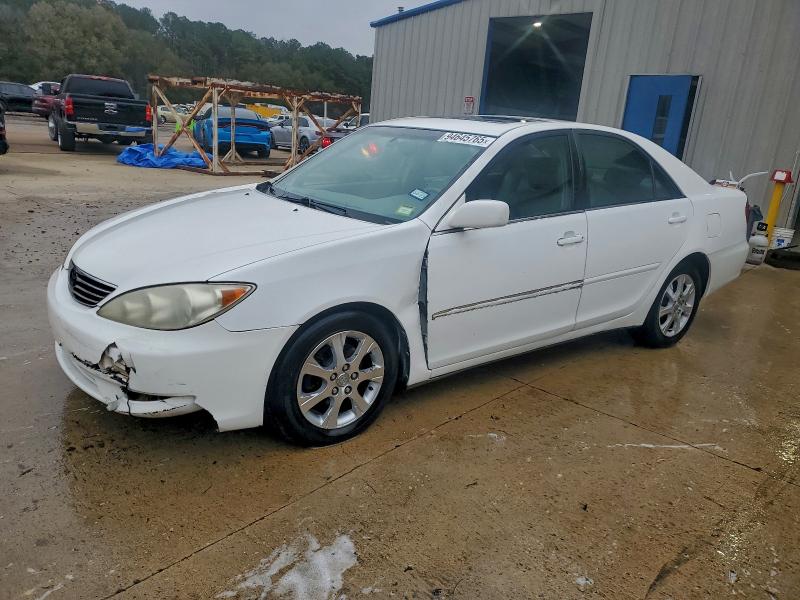 TOYOTA CAMRY LE 2005 with VIN JTDBF32KX50165830 - Photo from auction