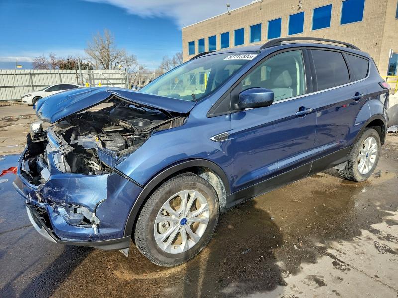 FORD ESCAPE SE 2018 with VIN 1FMCU9GD4JUB24535 - Photo from auction