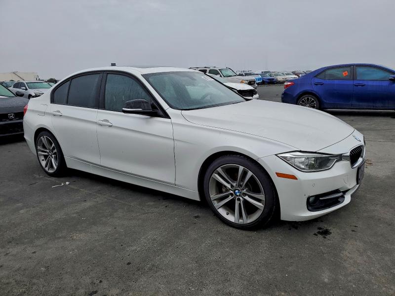 Photo 4 from auction – 2014 BMW 3 SERIES with VIN WBA3D3C57EK153574