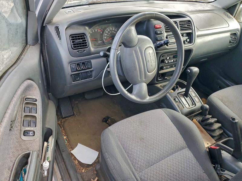 Photo 8 from auction – 2000 CHEVROLET TRACKER with VIN 2CNBJ13C7Y6907750