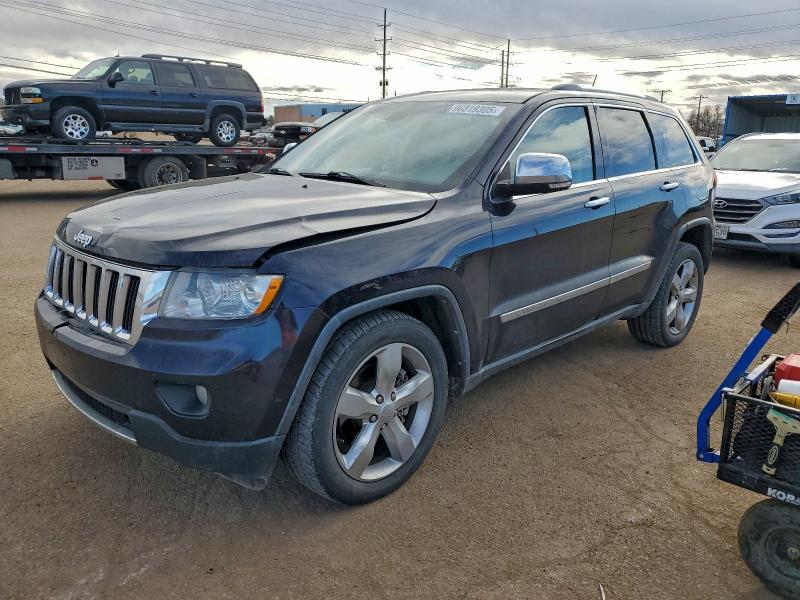 JEEP GRAND CHER 2011 with VIN 1J4RR5GT5BC619683 - Photo from auction