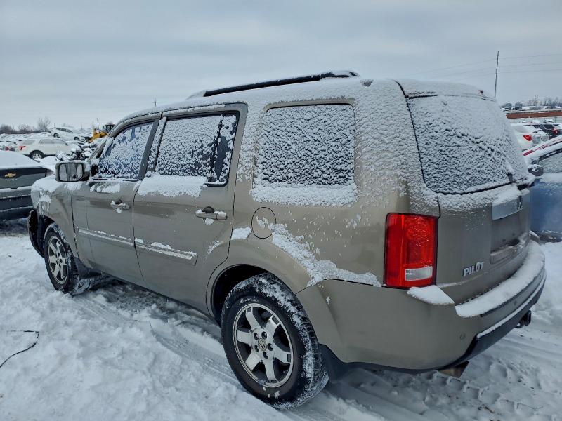 Photo 2 from auction – 2010 HONDA PILOT with VIN 5FNYF3H85AB014105
