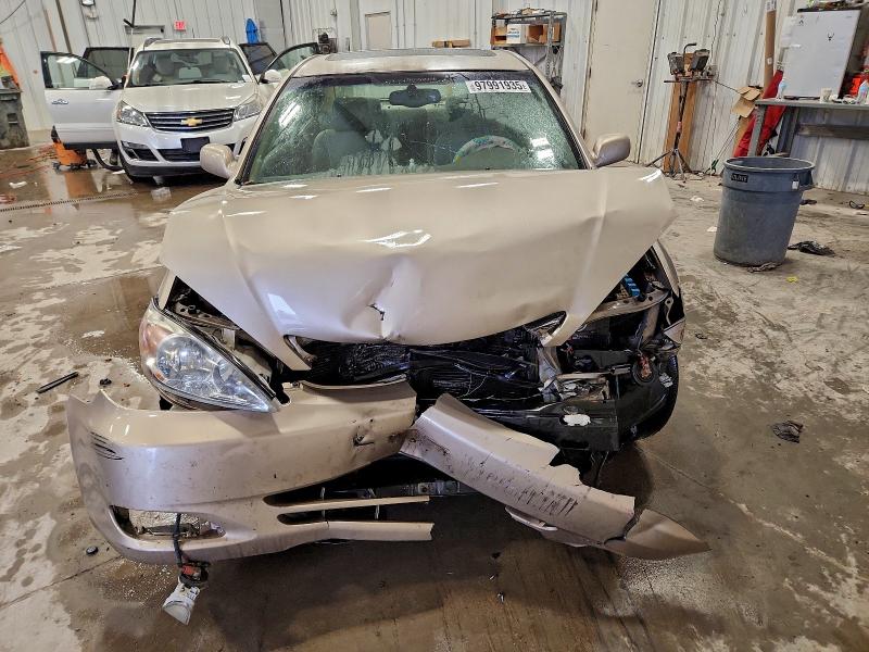 Photo 5 from auction – 2004 TOYOTA CAMRY LE with VIN 4T1BE30K74U925057