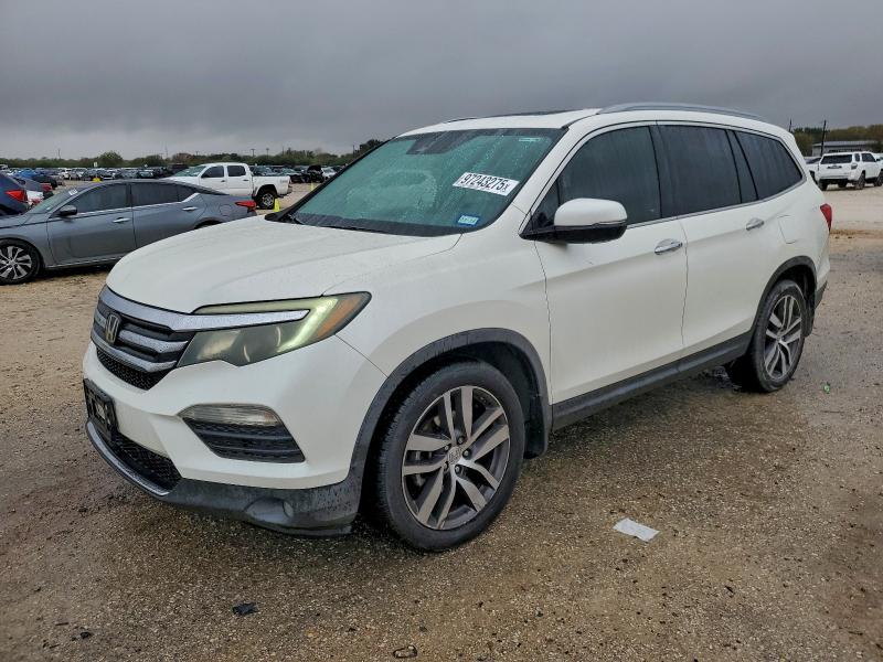HONDA PILOT 2016 with VIN 5FNYF6H95GB039427 - Photo from auction