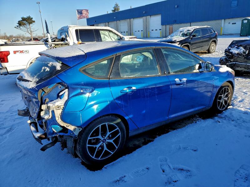Photo 3 from auction – 2018 FORD FOCUS SEL with VIN 1FADP3M27JL277129