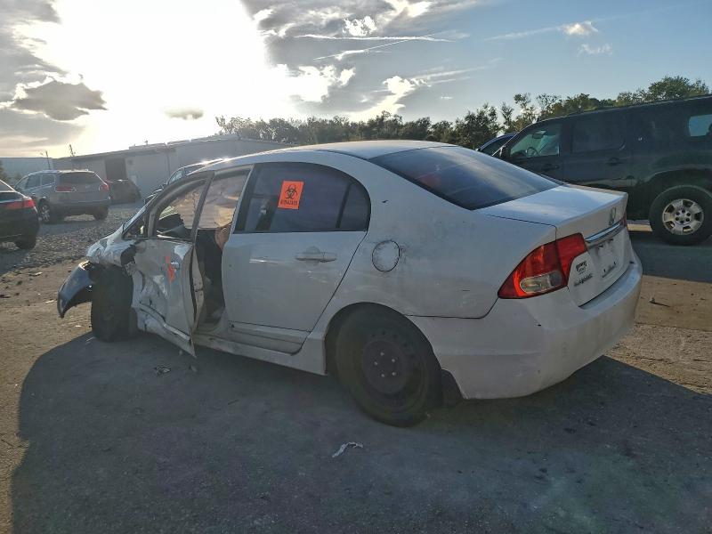 Photo 2 from auction – 2010 HONDA CIVIC with VIN 19XFA1F57AE083290