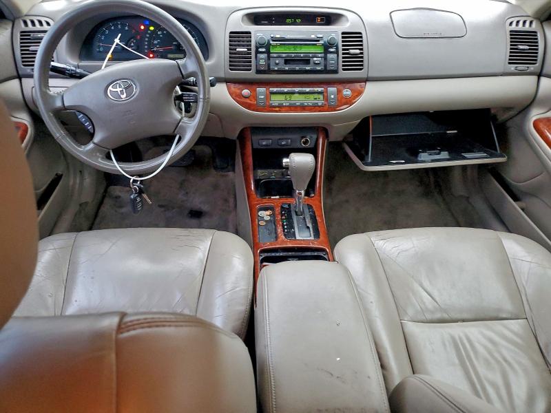 Photo 8 from auction – 2004 TOYOTA CAMRY LE with VIN 4T1BF30K34U572328