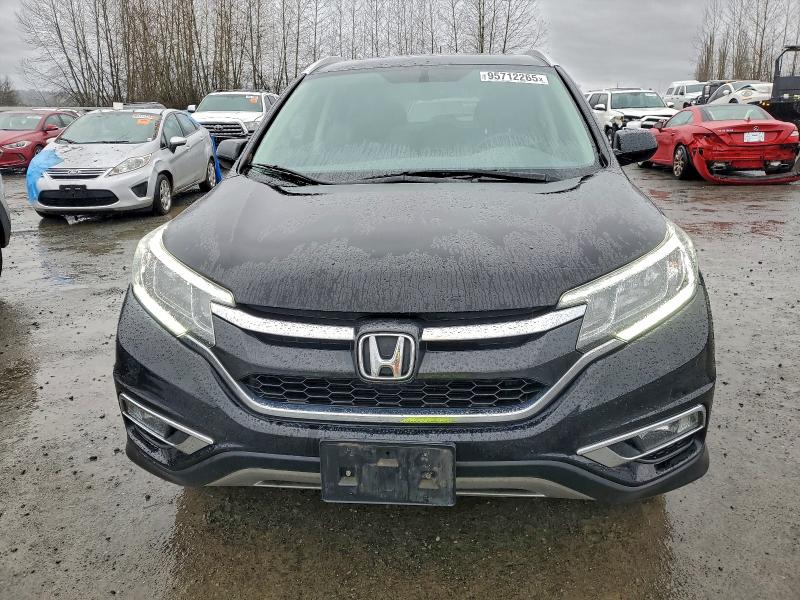 Photo 5 from auction – 2015 HONDA CR-V EXL with VIN 2HKRM4H79FH642006