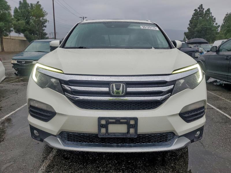 Photo 5 from auction – 2017 HONDA PILOT TOUR with VIN 5FNYF6H98HB054196