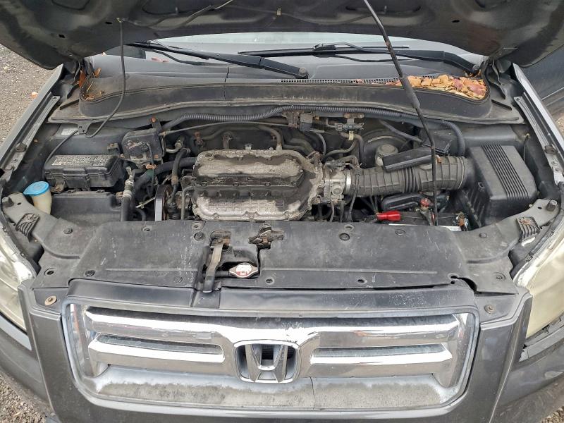 Photo 12 from auction – 2007 HONDA PILOT EXL with VIN 2HKYF18557H537709
