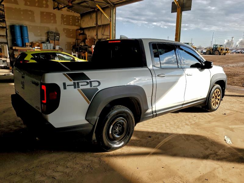 Photo 3 from auction – 2023 HONDA RIDGELINE with VIN 5FPYK3F86PB006223