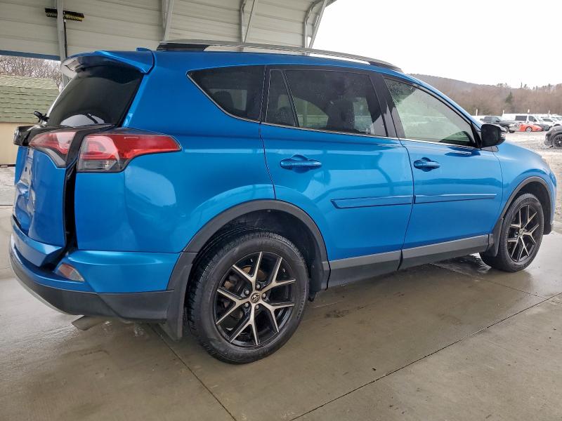 Photo 3 from auction – 2016 TOYOTA RAV4 SE with VIN JTMJFREV2GD178765