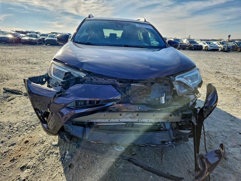 Photo 5 from auction – 2017 TOYOTA RAV4 SE with VIN 2T3JFREV5HW666516