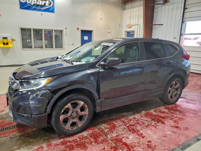 HONDA CR-V EXL 2017 with VIN 5J6RW2H80HL074776 - Photo from auction