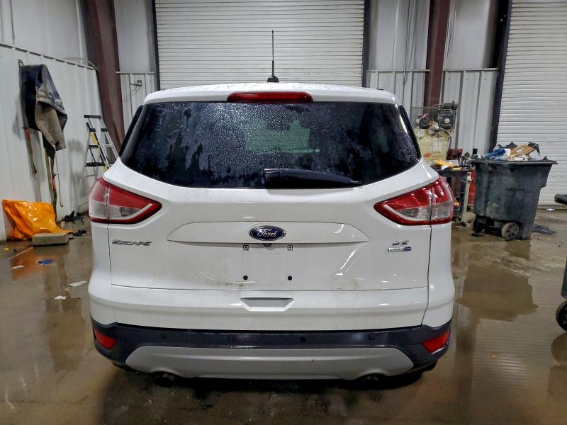Photo 6 from auction – 2016 FORD ESCAPE SE with VIN 1FMCU9GX4GUC90735