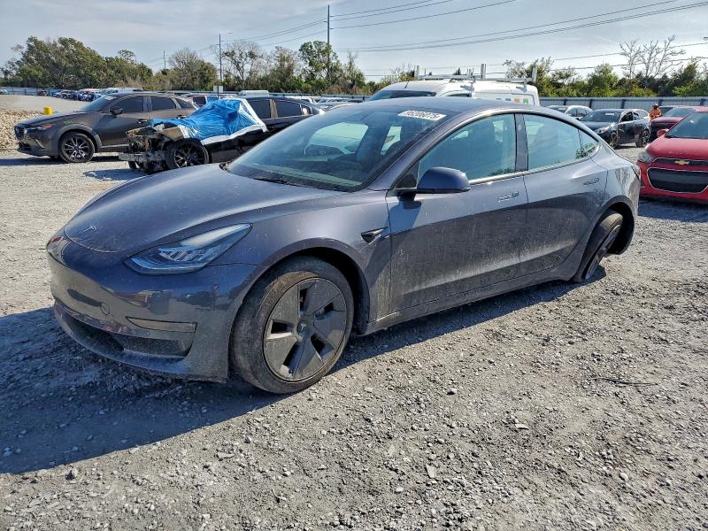 TESLA MODEL 3 2022 with VIN 5YJ3E1EBXNF260865 - Photo from auction