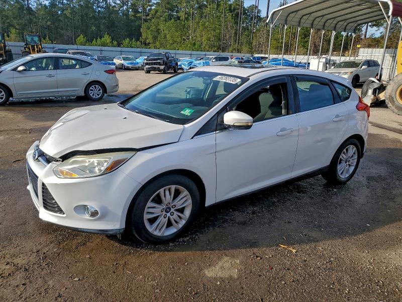 FORD FOCUS 2012 with VIN 1FAHP3M27CL306925 - Photo from auction