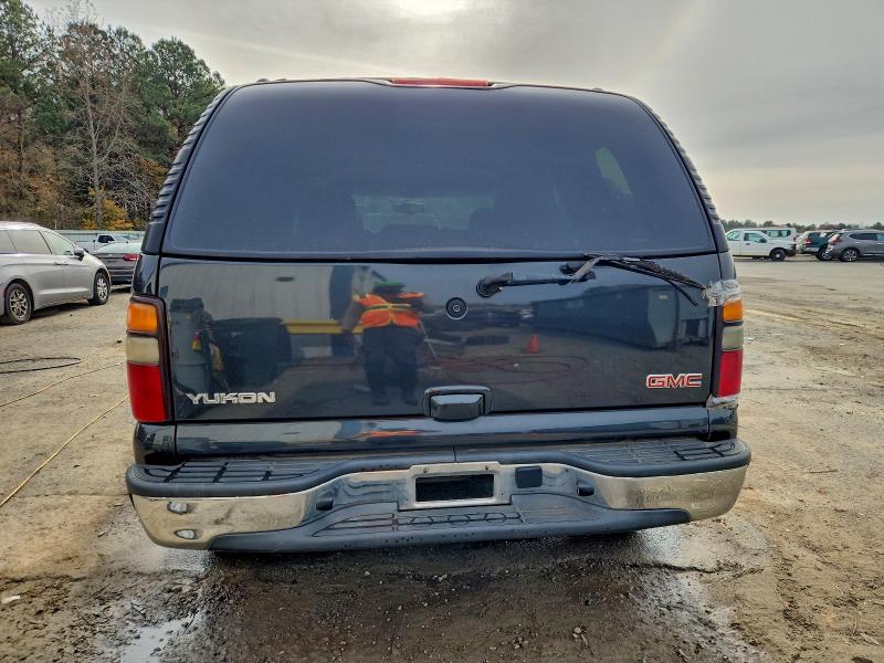 Photo 6 from auction – 2004 GMC YUKON with VIN 1GKEC13Z04R103566