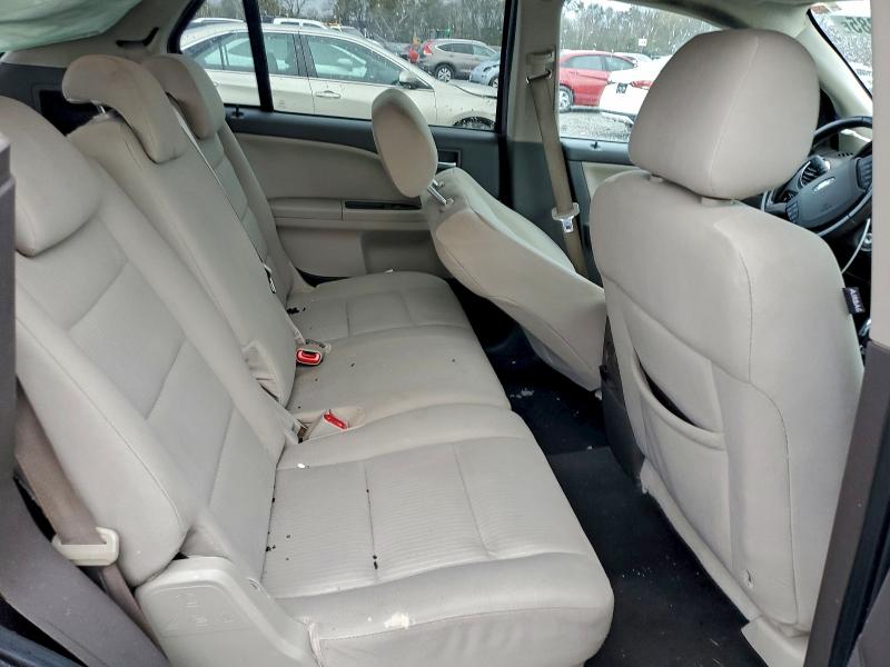 Photo 11 from auction – 2009 FORD TAURUS X S with VIN 1FMDK02W69GA02462