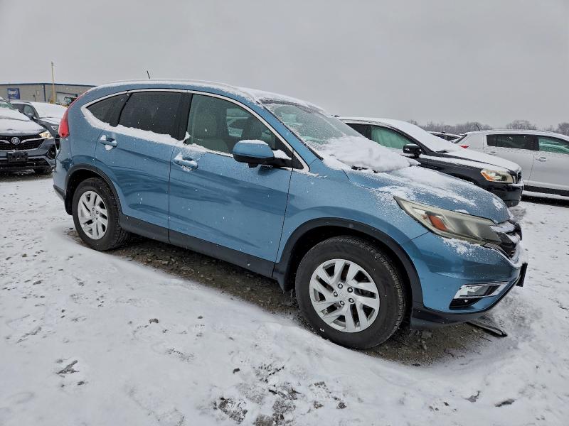 Photo 4 from auction – 2015 HONDA CR-V EXL with VIN 5J6RM4H76FL049015