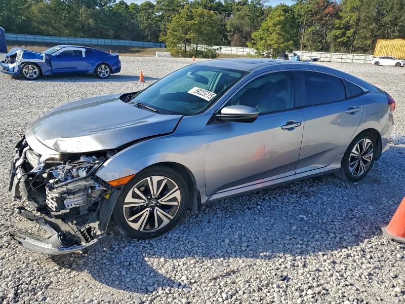 HONDA CIVIC EXL 2016 with VIN 2HGFC1F79GH637360 - Photo from auction