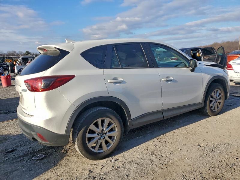 Photo 3 from auction – 2016 MAZDA CX-5 TOURI with VIN JM3KE4CY4G0861069