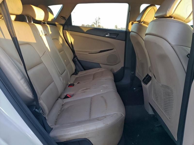 Photo 11 from auction – 2016 HYUNDAI TUCSON LIM with VIN KM8J33A22GU025624