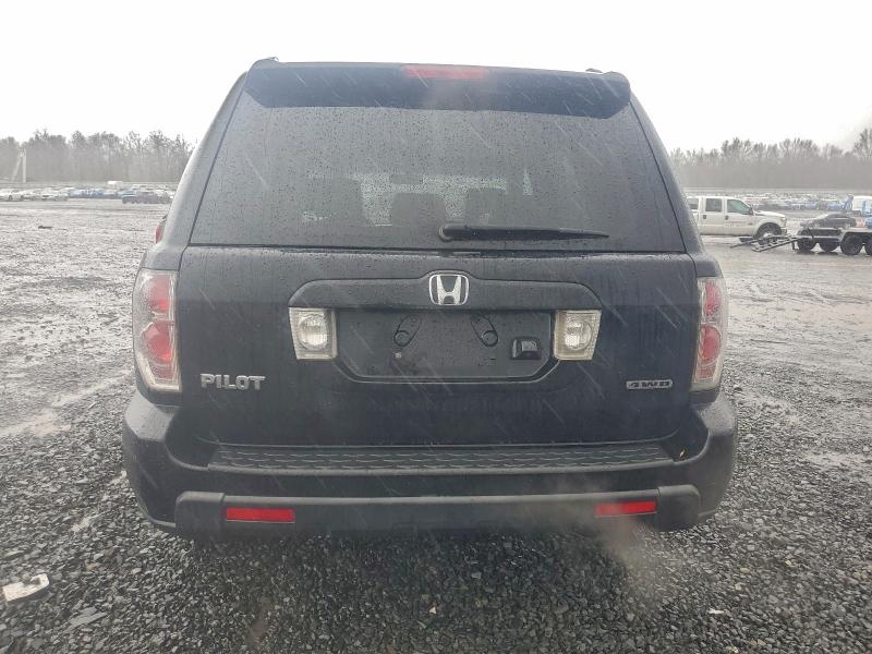 Photo 6 from auction – 2006 HONDA PILOT EX with VIN 2HKYF18786H540913