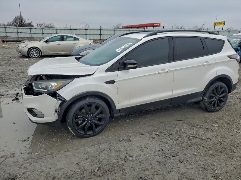 FORD ESCAPE TIT 2017 with VIN 1FMCU0J94HUB20088 - Photo from auction