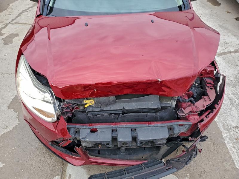 Photo 11 from auction – 2014 FORD FOCUS SE with VIN 1FADP3K29EL298959