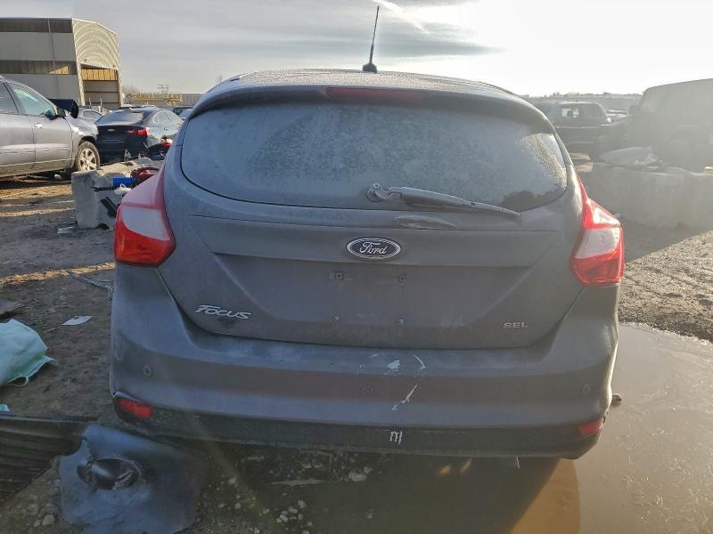 Photo 6 from auction – 2012 FORD FOCUS with VIN 1FAHP3M25CL261919