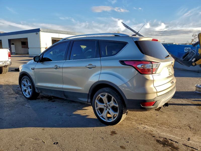 Photo 2 from auction – 2017 FORD ESCAPE TIT with VIN 1FMCU0JD7HUE36976