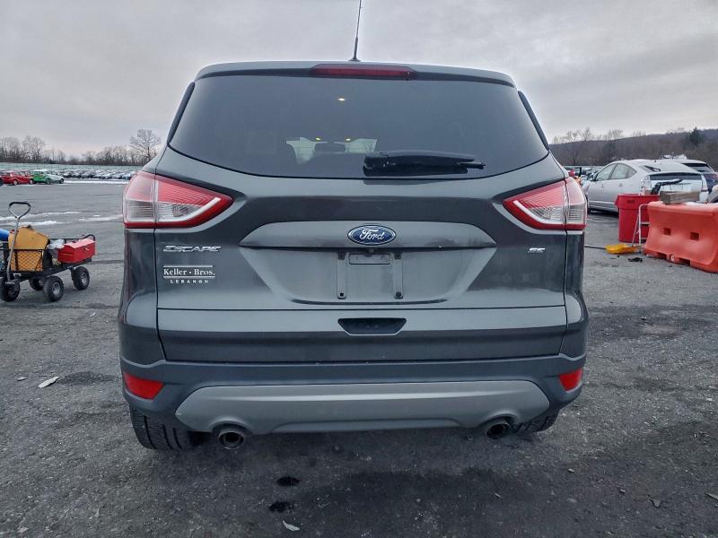 Photo 6 from auction – 2015 FORD ESCAPE SE with VIN 1FMCU0G79FUA27330