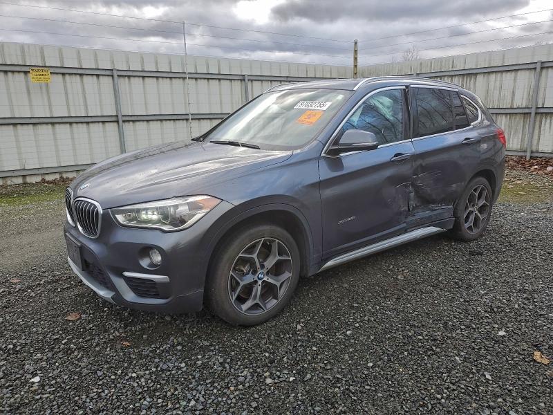 BMW X1 XDRIVE2 2017 with VIN WBXHT3Z32H4A56539 - Photo from auction