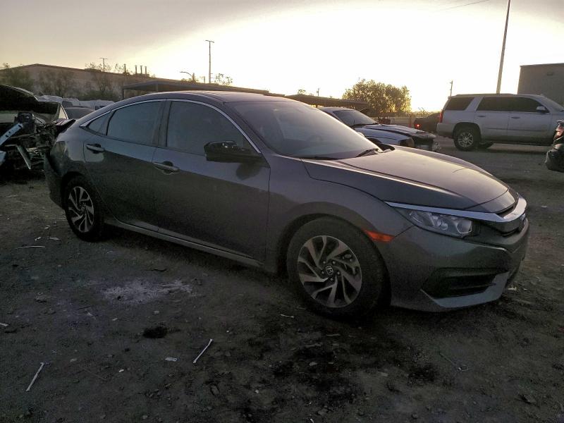 Photo 4 from auction – 2018 HONDA CIVIC EX with VIN 19XFC2F76JE003415