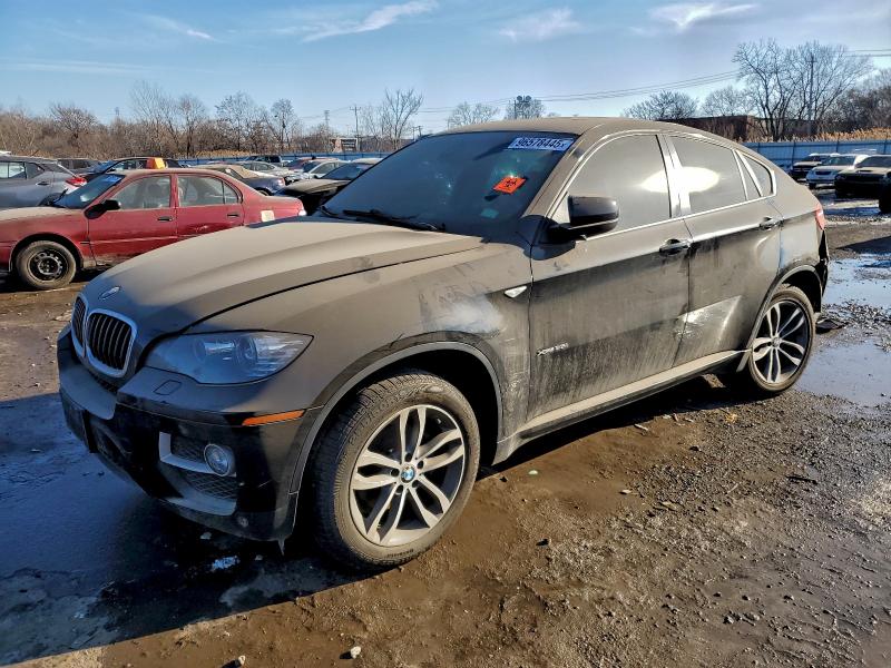 BMW X6 XDRIVE3 2014 with VIN 5UXFG2C57E0K41715 - Photo from auction