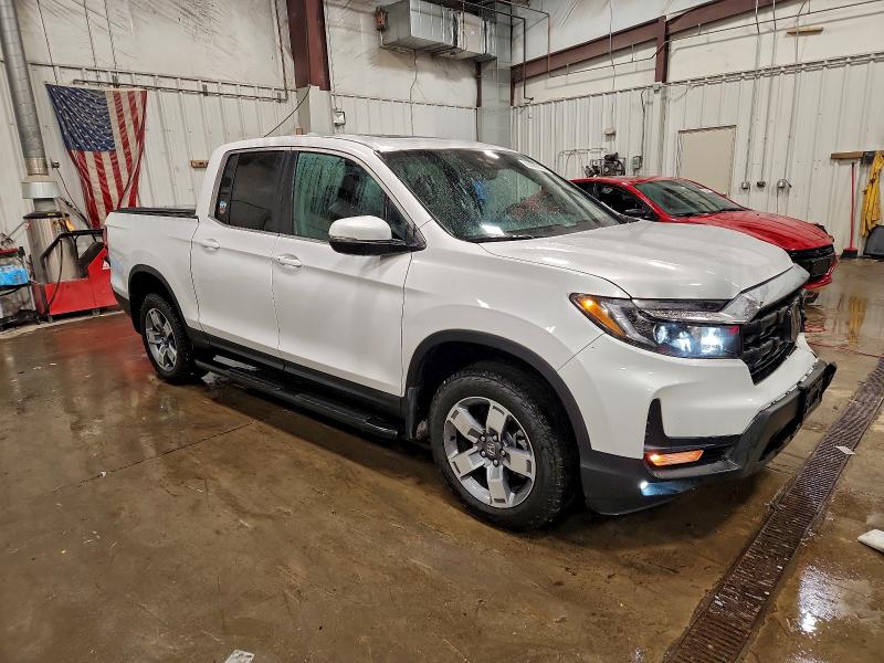 Photo 4 from auction – 2025 HONDA RIDGELINE with VIN 5FPYK3F53SB011331