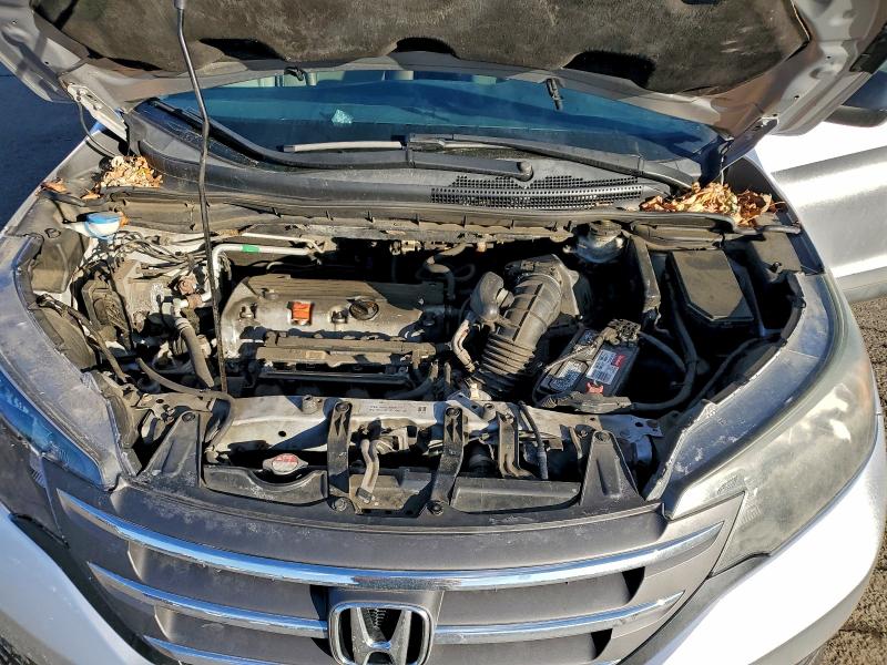 Photo 12 from auction – 2014 HONDA CR-V LX with VIN 2HKRM4H33EH671707
