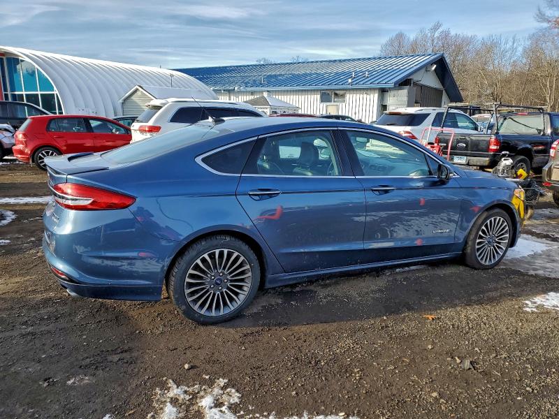 Photo 3 from auction – 2018 FORD FUSION TIT with VIN 3FA6P0RU2JR269796