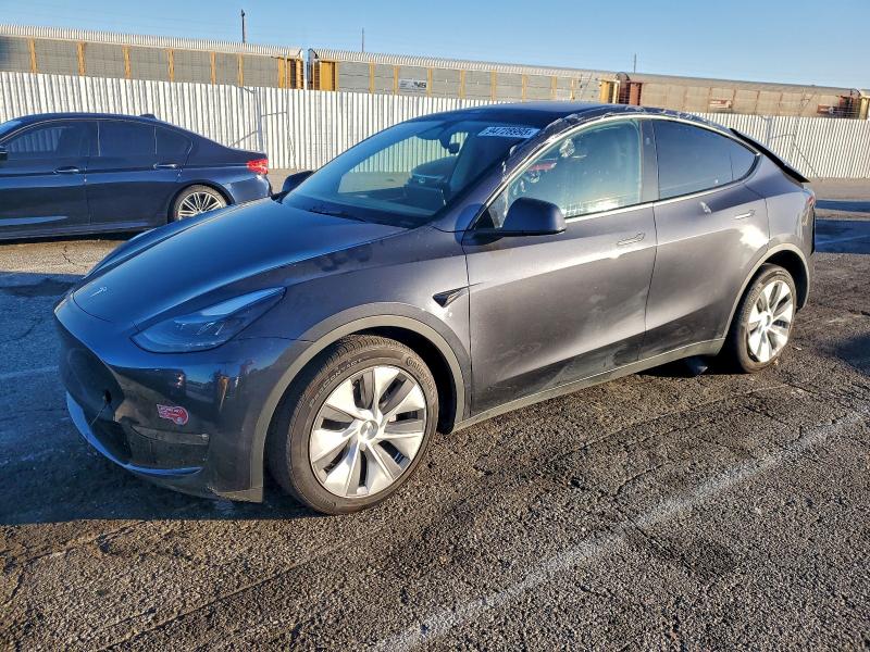 TESLA MODEL Y 2024 with VIN 7SAYGDEE4RF077871 - Photo from auction