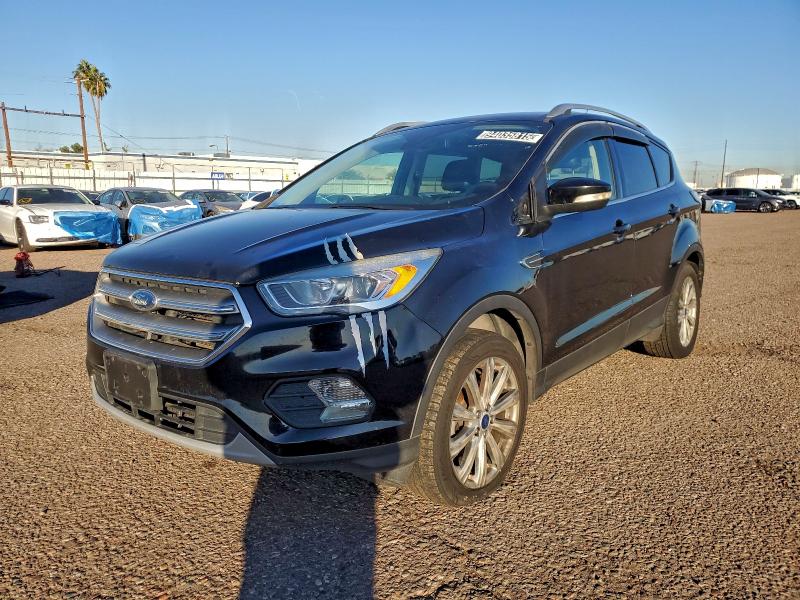FORD ESCAPE TIT 2017 with VIN 1FMCU0JD5HUE43358 - Photo from auction